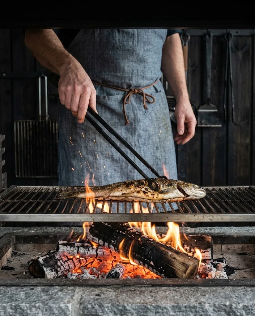 Artist's impression of an open fire in the kitchen, with a cook's hands at work